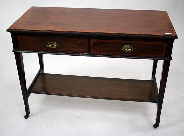 Appraisal: AN EDWARDIAN MAHOGANY AND INLAID WASHSTAND with cross banded top