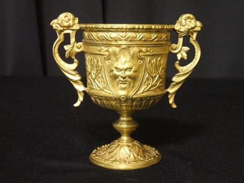 Appraisal: GILT-BRONZE TWO HANDLED CUP Neo-Classic style with scroll floral handles