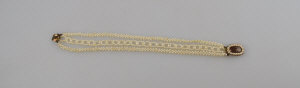 Appraisal: Georgian seed pearl three-row bracelet on oval cluster snap enclosing