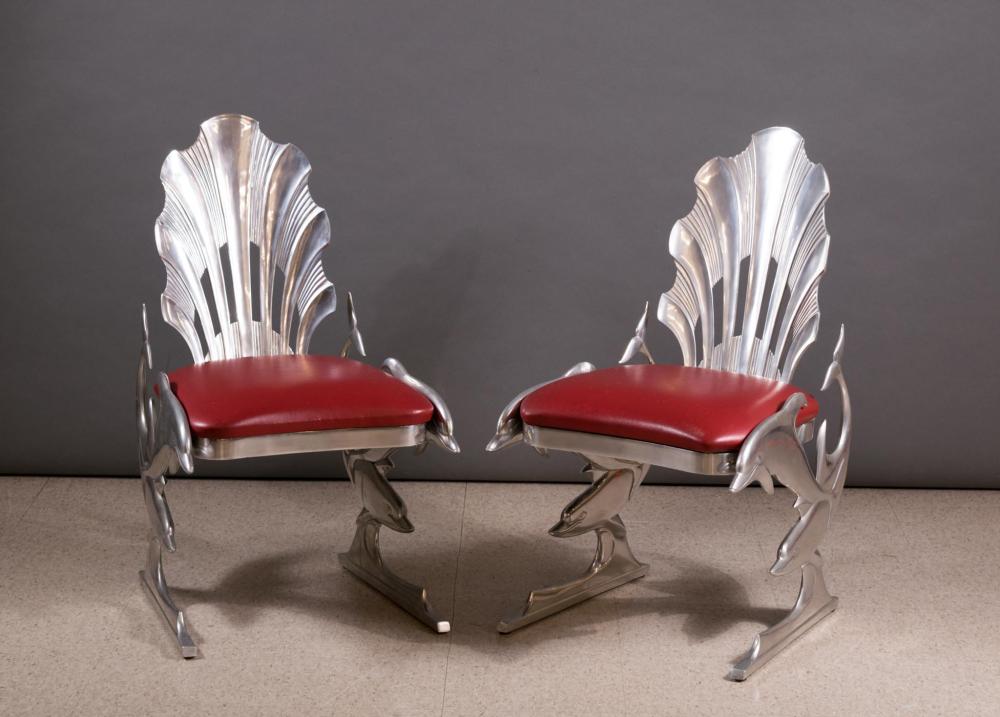 Appraisal: A PAIR OF RAY LEWIS POST-MODERN STYLE ALUMINUM DOLPHIN CHAIRS