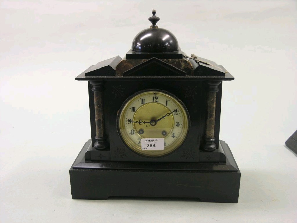 Appraisal: A Victorian black slate mantel clock architectural design with two-train