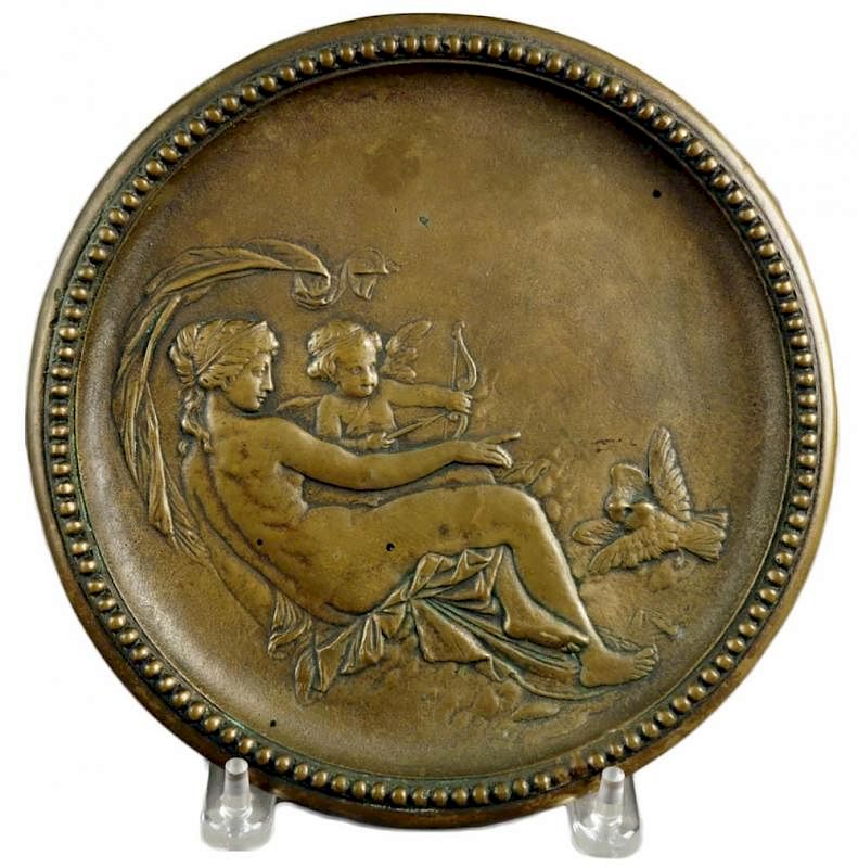 Appraisal: A Cast Brass Plaque depicting Venus and Cupid Inthe form