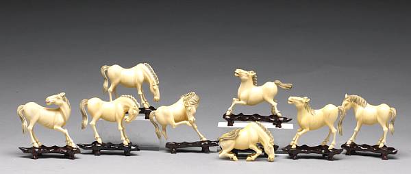 Appraisal: A group of eight ivory horses of Mu Wang th