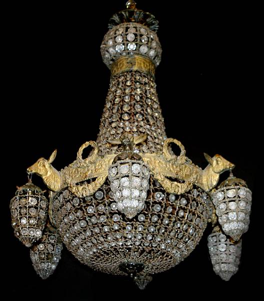 Appraisal: A Neoclassical style bronze and crystal six light chandelier height