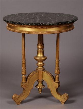 Appraisal: SECOND EMPIRE CARVED GILTWOOD MARBLE-TOP GU RIDON IN THE LOUIS