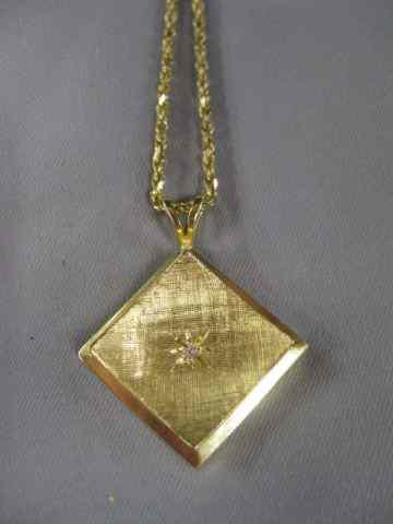 Appraisal: k Gold Pendant Chain diamond in convex '' square in