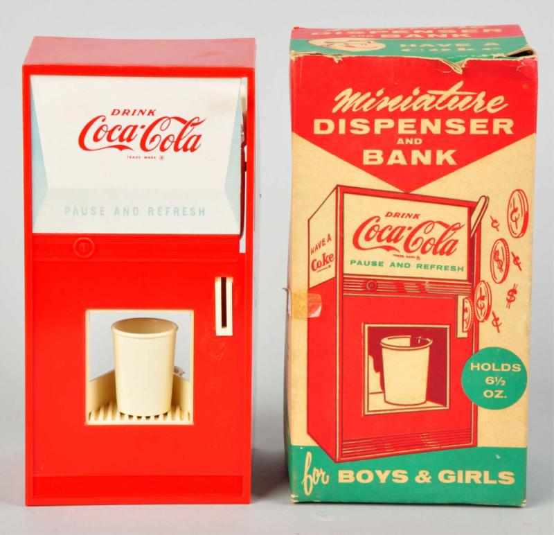 Appraisal: Coca-Cola Miniature Dispenser Savings Bank Toy Complete with original box