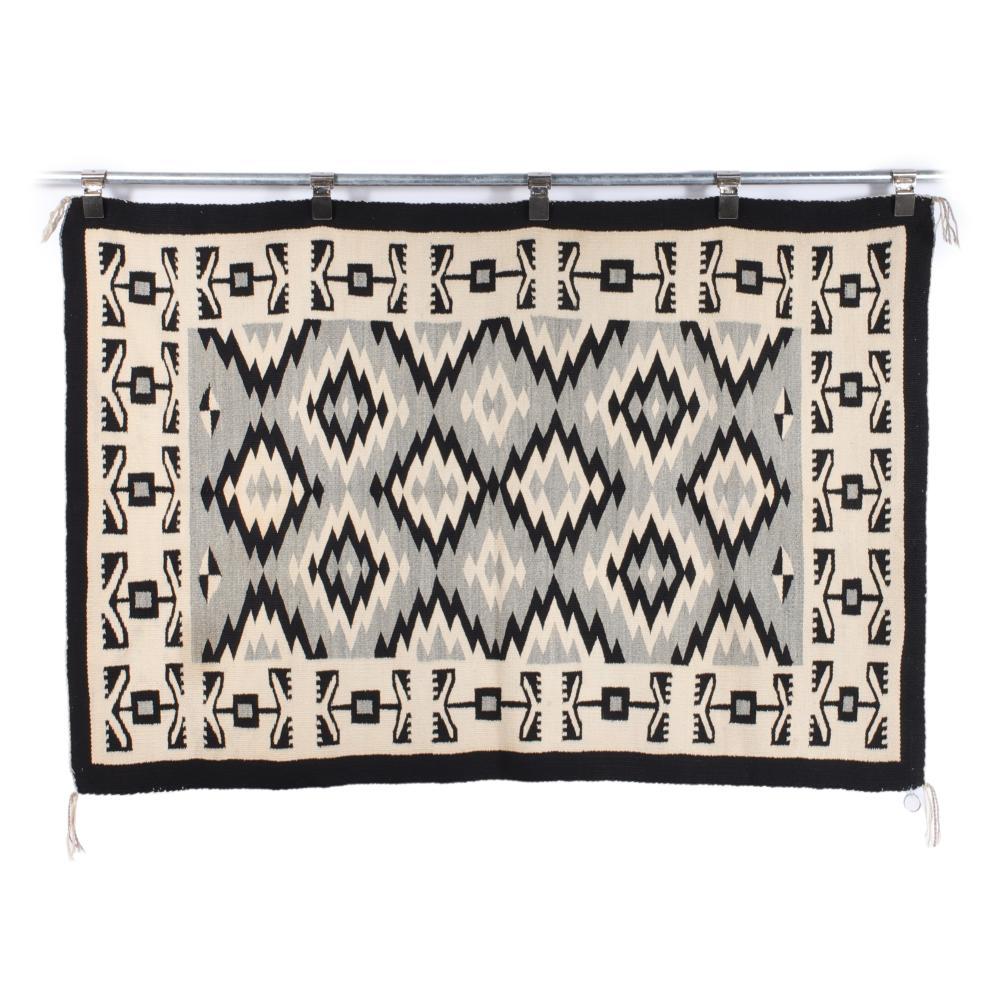 Appraisal: NAVAJO RUG CA DOUBLE RAINCLOUD MOTIF BORDER WITH CONCENTRIC SERRATED