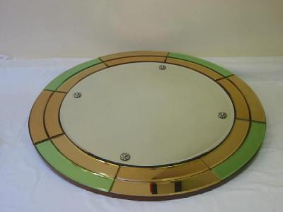 Appraisal: AN ART DECO WALL MIRROR of circular form with mirror