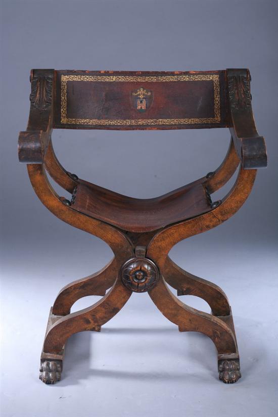 Appraisal: SAVONAROLA CARVED FRUITWOOD ARMCHAIR th century with gilt-tooled nailed leather