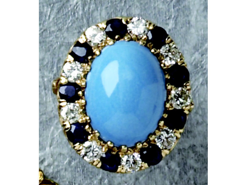 Appraisal: PERSIAN TURQUOISE DIAMOND AND SAPPHIRE RING k yellow gold oval