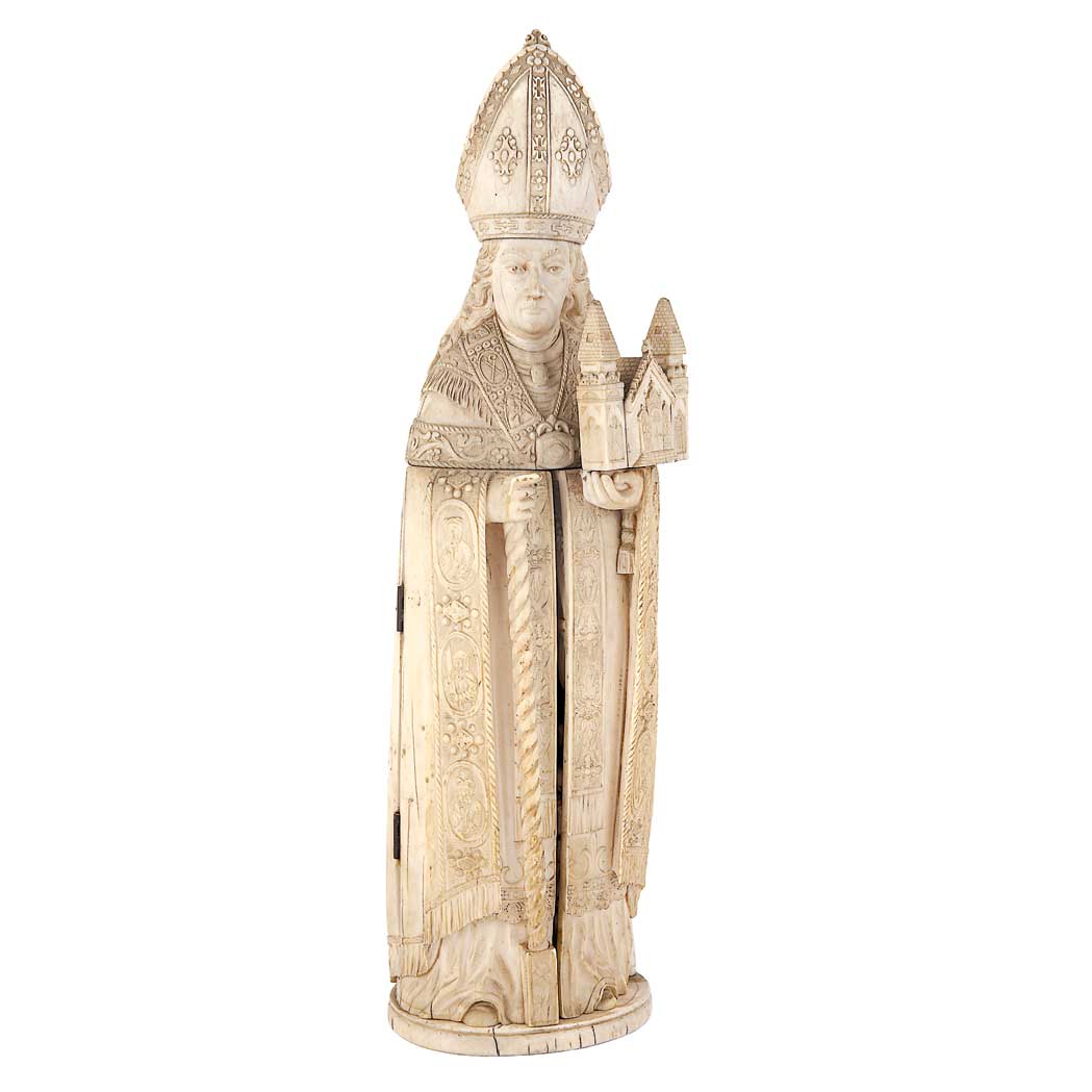 Appraisal: French Carved Ivory Tryptic th Century Carved as a bishop