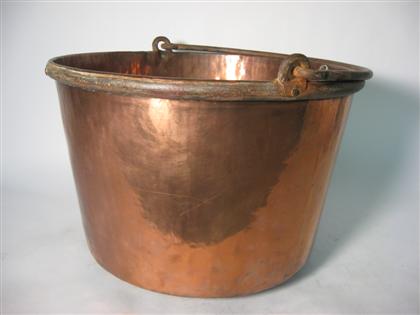 Appraisal: Copper apple butter kettle th century Iron swing handle Dia