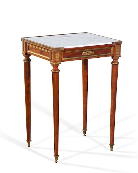 Appraisal: A Directoire mahogany occasional table A Directoire gilt bronze mounted