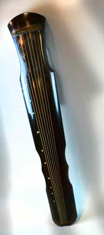 Appraisal: Chinese Hardwood Guzheng Stringed InstrumentFinely carved and lacquered with seven