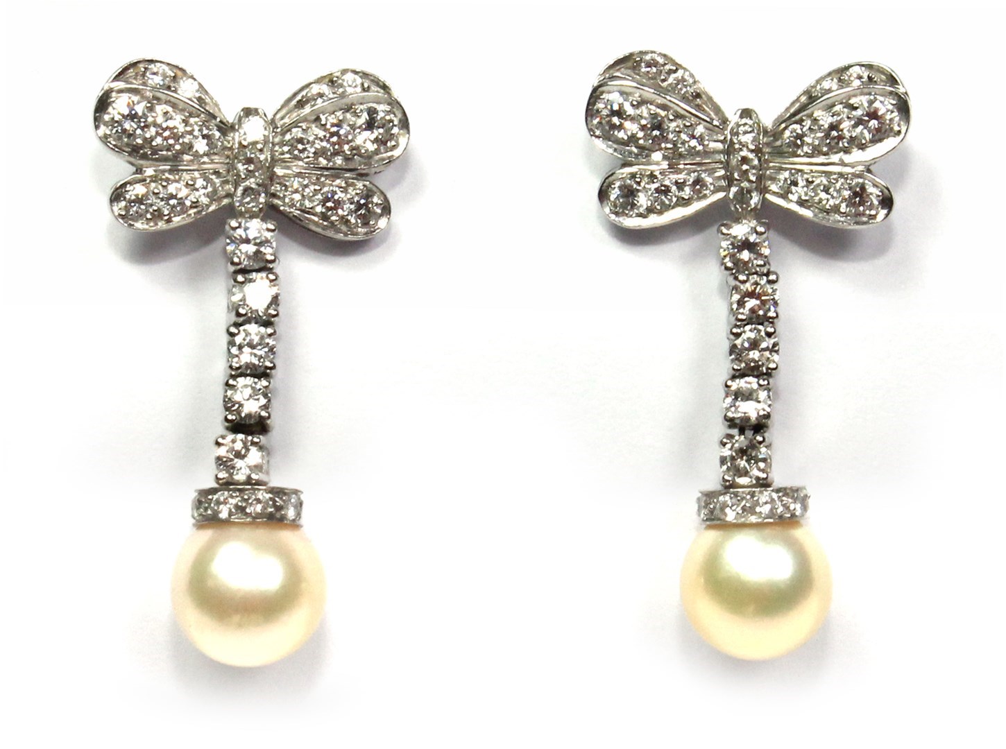 Appraisal: A pair of diamond and cultured pearl set earrings each