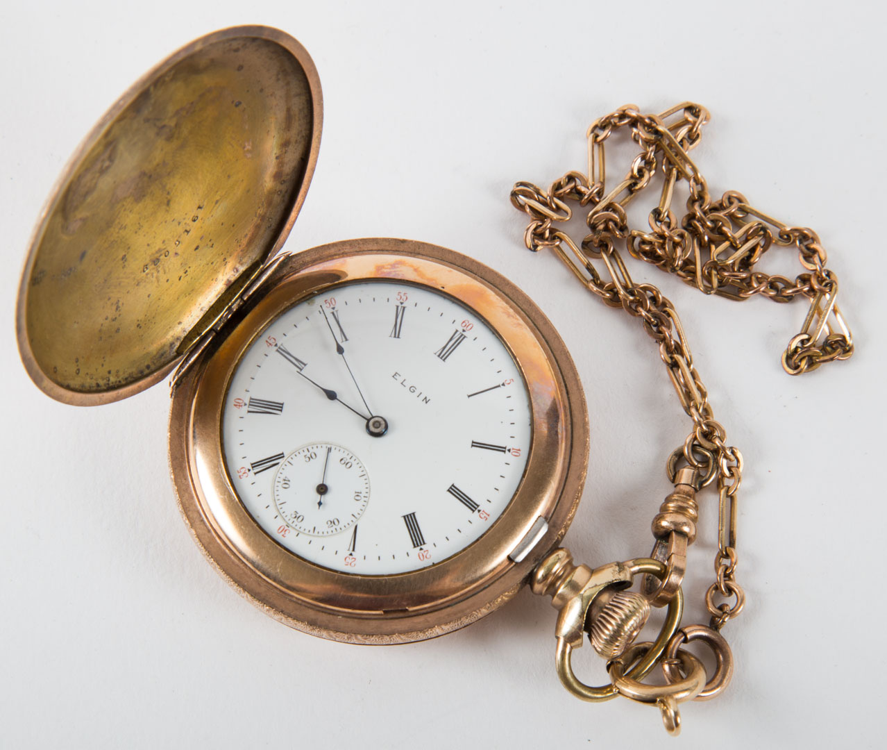 Appraisal: An Elgin Pocket Watch with Chain pocket watch is years