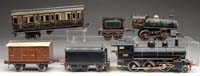 Appraisal: NICE MISC LOT OF TRAINS Lot includes Aster gauge live