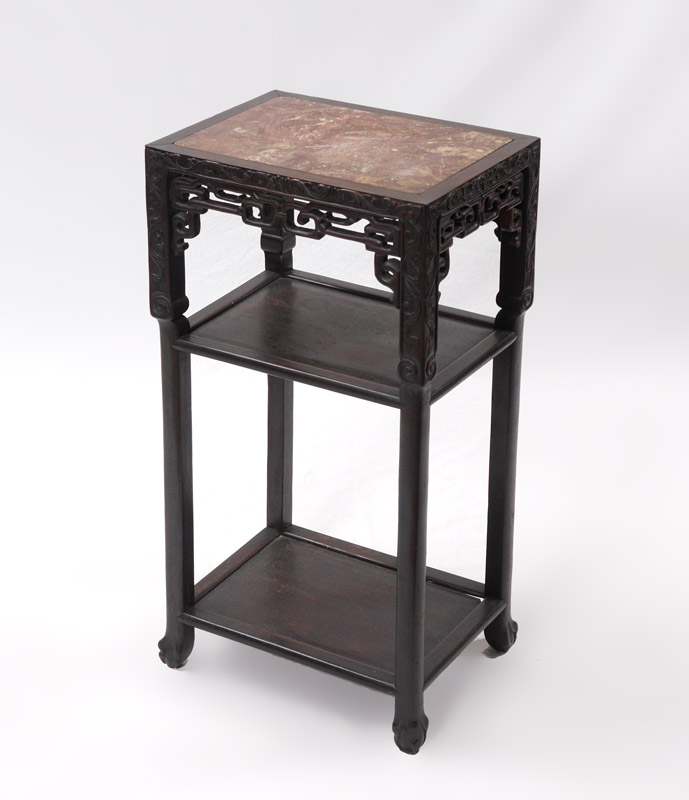 Appraisal: CARVED MARBLE TOP ORIENTAL STAND Inset rectangular marble top carved