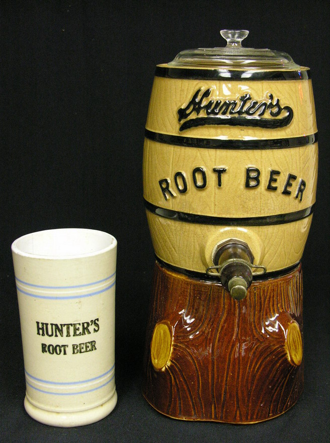 Appraisal: HUNTER CROCK ROOT BEER DISPENSER AND MUG Circa 's- 's