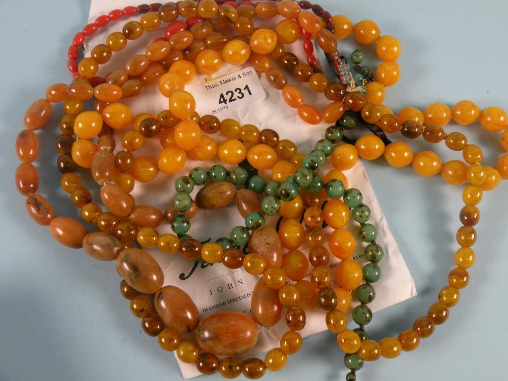 Appraisal: Various amber type and other beads