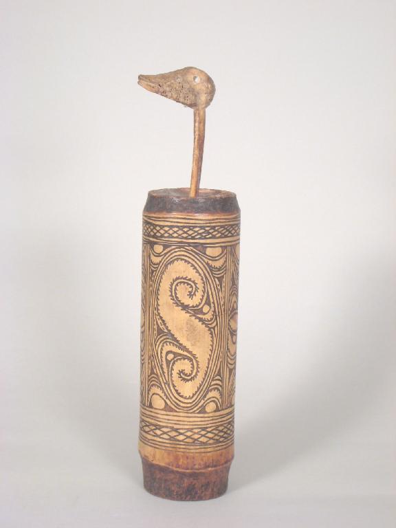 Appraisal: A bamboo Lime Container and bone Spatula animal head handle