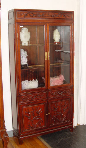 Appraisal: CHINESE CARVED CHINA DISPLAY CABINET Tall front upper section with