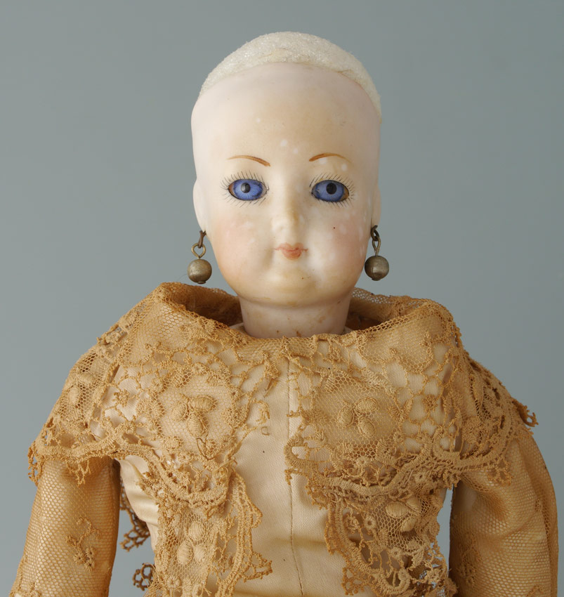 Appraisal: ANTIQUE FRENCH FASHION DOLL Bisque head fashion doll with blue