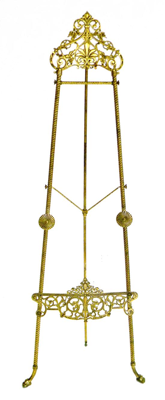 Appraisal: Victorian tripod floor easel brass elaborate pierced scroll with anthemion