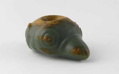 Appraisal: A Chinese jade carving of a two-headed mythical beast one