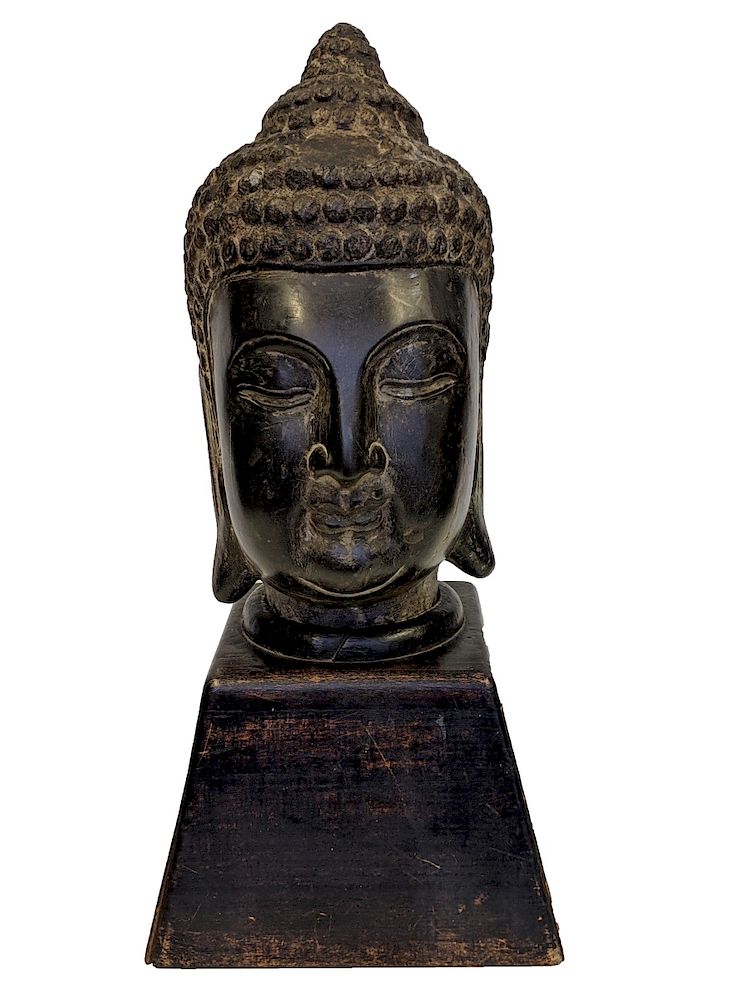 Appraisal: Limestone Head of Buddha Nepal Carved of dark grey limestone