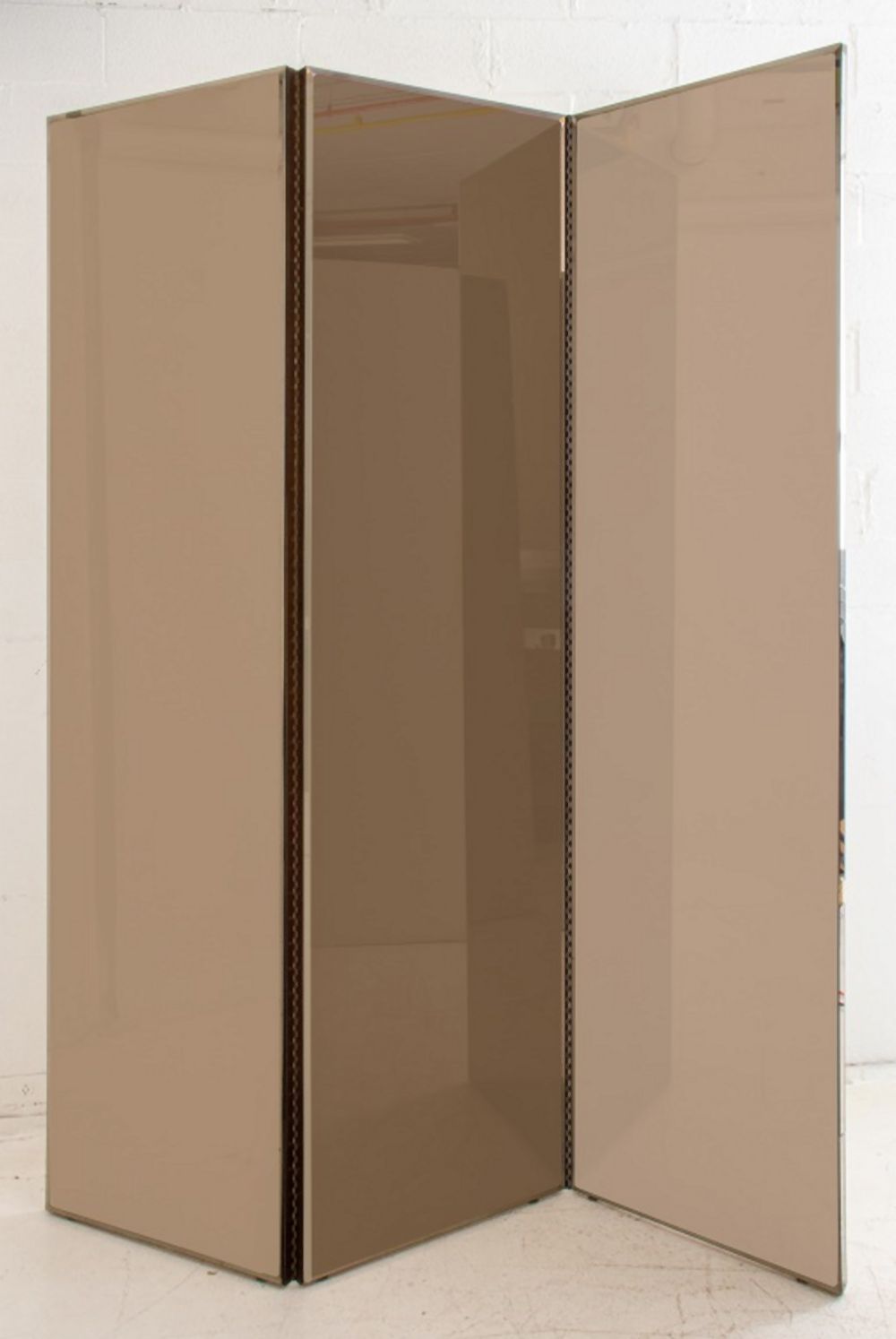 Appraisal: LARGE THREE PANEL BRONZE-MIRRORED SCREEN Large three panel bronze-tinted mirror