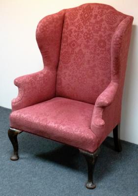 Appraisal: An th Century style wing armchair on cabriole front legs