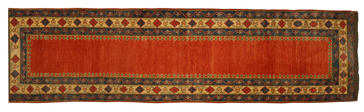 Appraisal: ORIENTAL RUG KAZAK DESIGN RUNNER ' x ' Open red