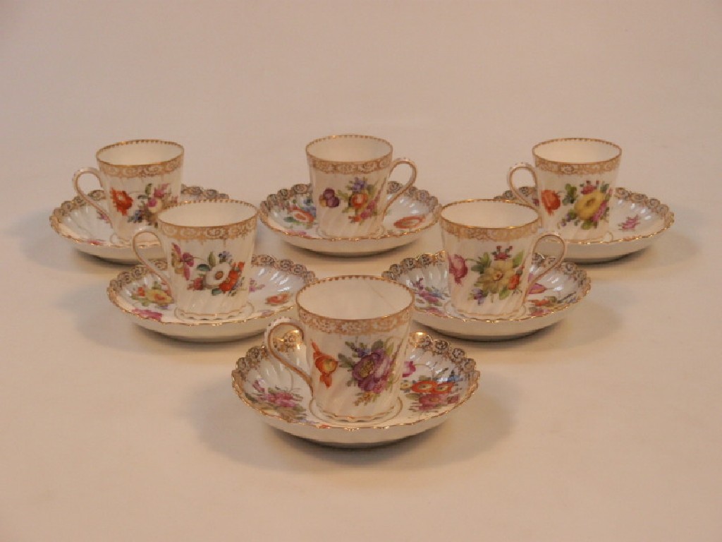 Appraisal: A set of six Dresden coffee cups and saucers of