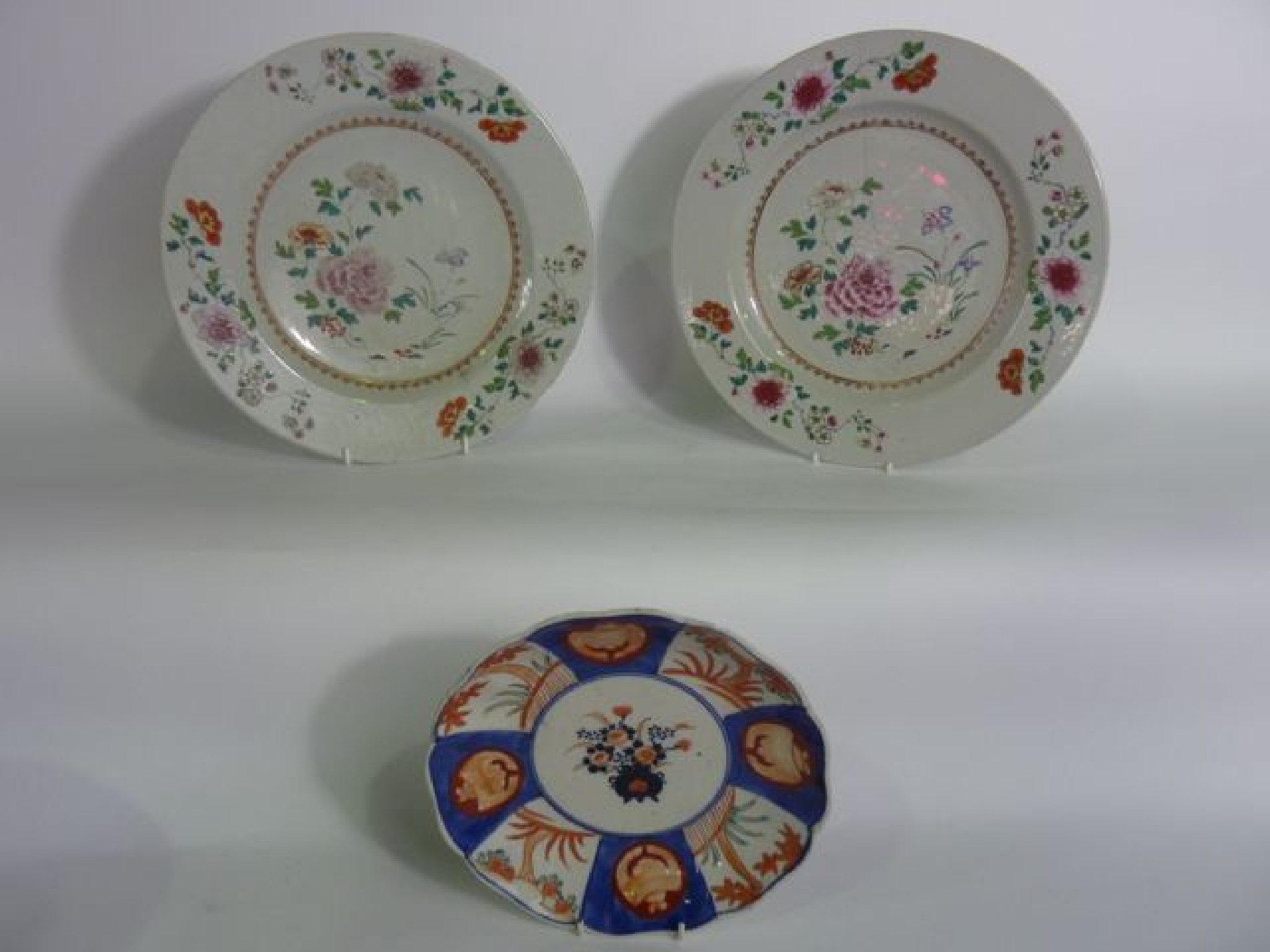 Appraisal: A pair of th century oriental Famille Rose plates with