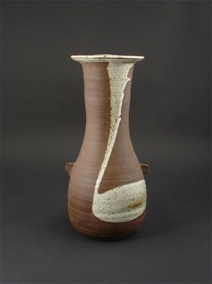 Appraisal: A tall Janet Leach stoneware vase with small lug handles