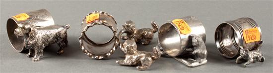 Appraisal: Four American Aesthetic style silver-plated figural napkin rings with dog