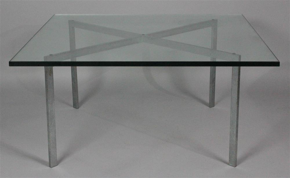 Appraisal: CONTEMPORARY GLASS COFFEE TABLE in glass top above a silver