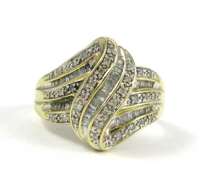 Appraisal: DIAMOND AND TEN KARAT YELLOW GOLD RING with rows of