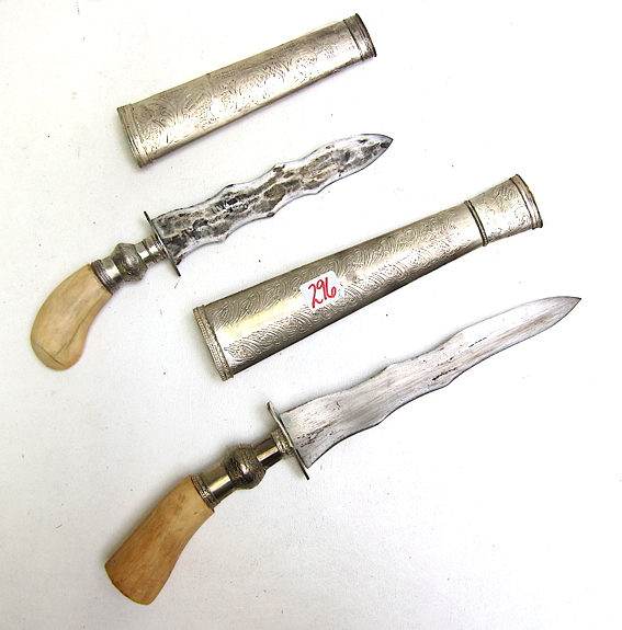 Appraisal: TWO BONE HANDLED KRIS BLADES AND SHEATHS having silver plated