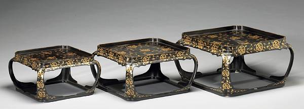 Appraisal: Three gilt and black lacquer graduated footed trays Each with