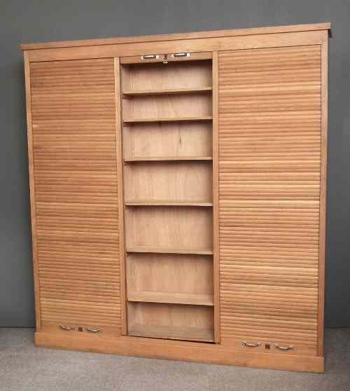 Appraisal: A th Century Continental light oak bookcase fitted eighteen shelves