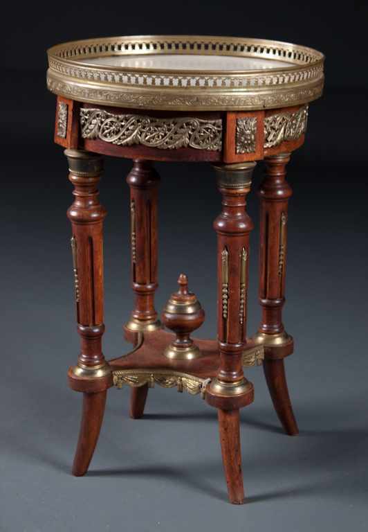 Appraisal: Louis XVI style ormolu-mounted carved wood marble-top table curculaire elaborate