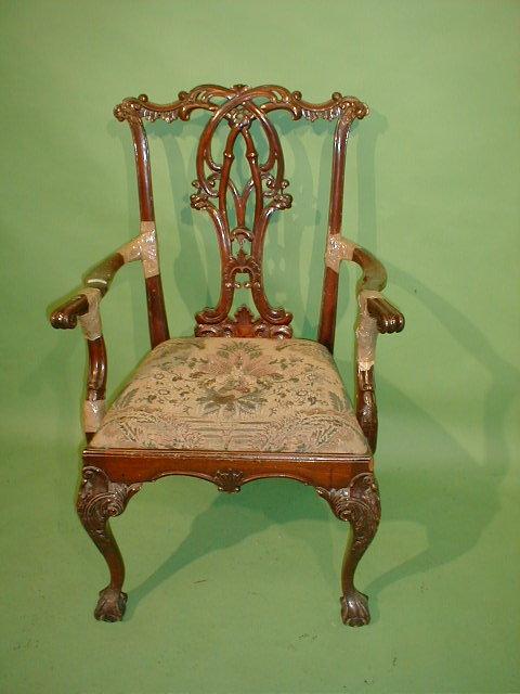 Appraisal: An unusual mahogany open carver chair with pierced splat in