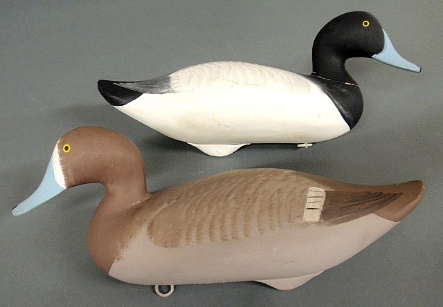 Appraisal: - Bluebill hen and drake carved and paint decorated decoys