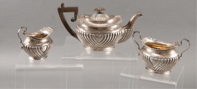 Appraisal: Sterling Silver Tea Pot Creamer Sugar Three piece set Includes