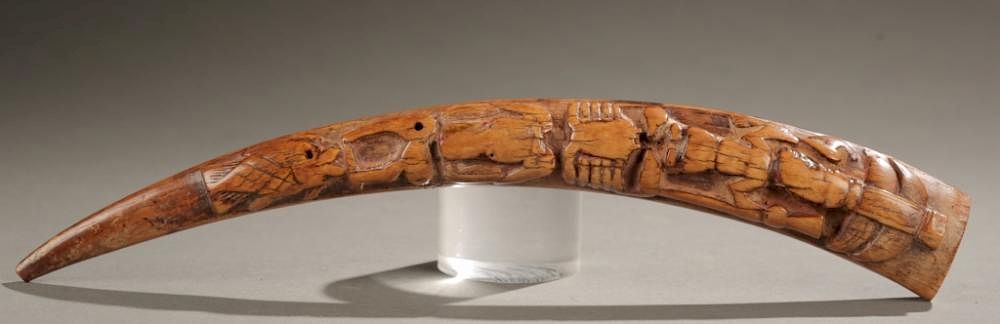 Appraisal: Nigerian ivory oliphant th th c An ivory oliphant with