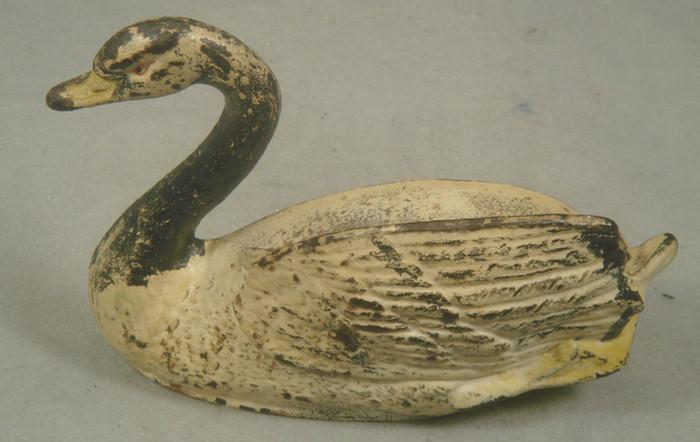 Appraisal: Cast iron doorstop black and white swan no stampings tall