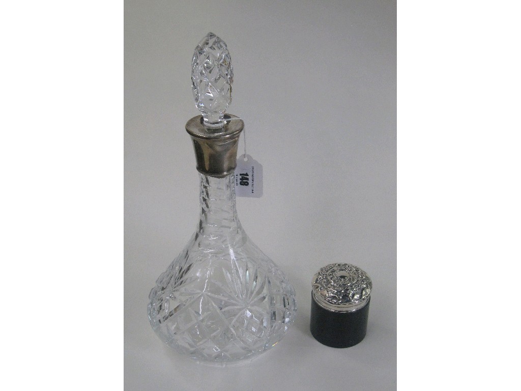 Appraisal: Lot comprising silver mounted decanter Birmingham and a silver topped